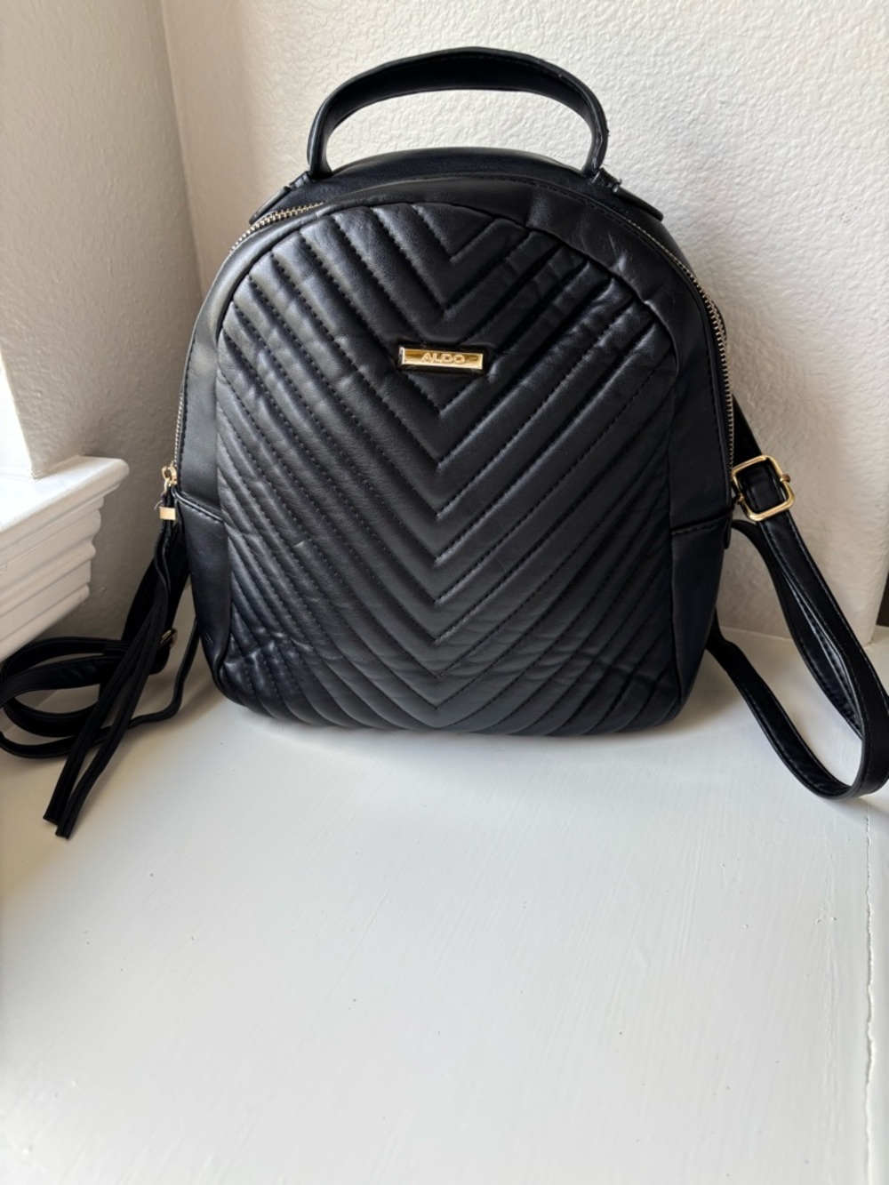 Aldo Black Quilted Chevron Backpack with Gold Accents